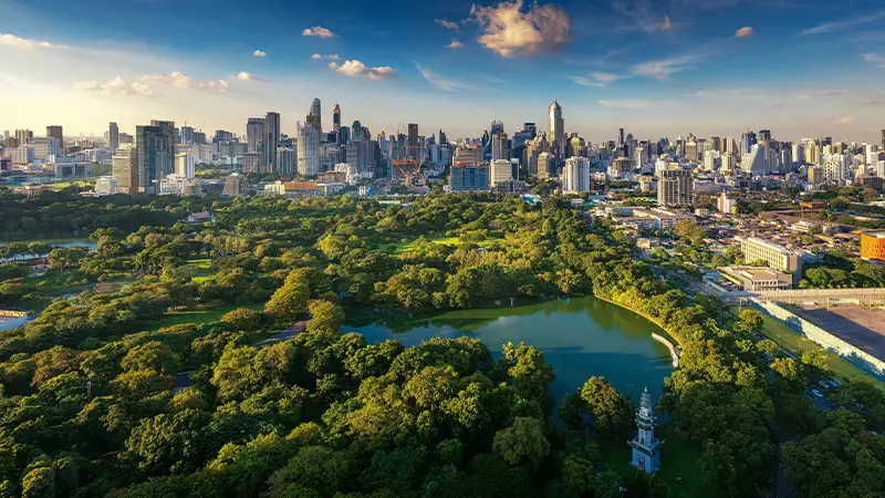 Lumphini Park with Bangkok city skyline
