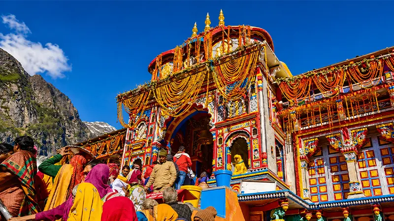 Pilgrims entering the decorated Badrinath Temple