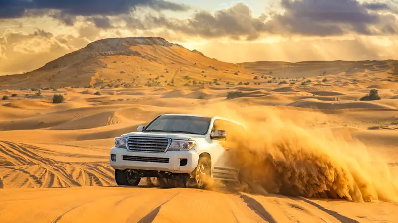 4x4 vehicle enjoying an exciting dune bashing adventure in the Dubai desert