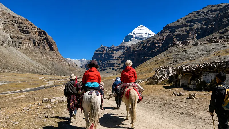 Pilgrims riding ponies on the Kailash Mansarovar trekking route